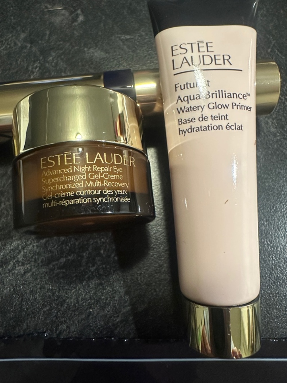 Estee Lauder Cream Pink Watery Glow Primer with Gold Accents